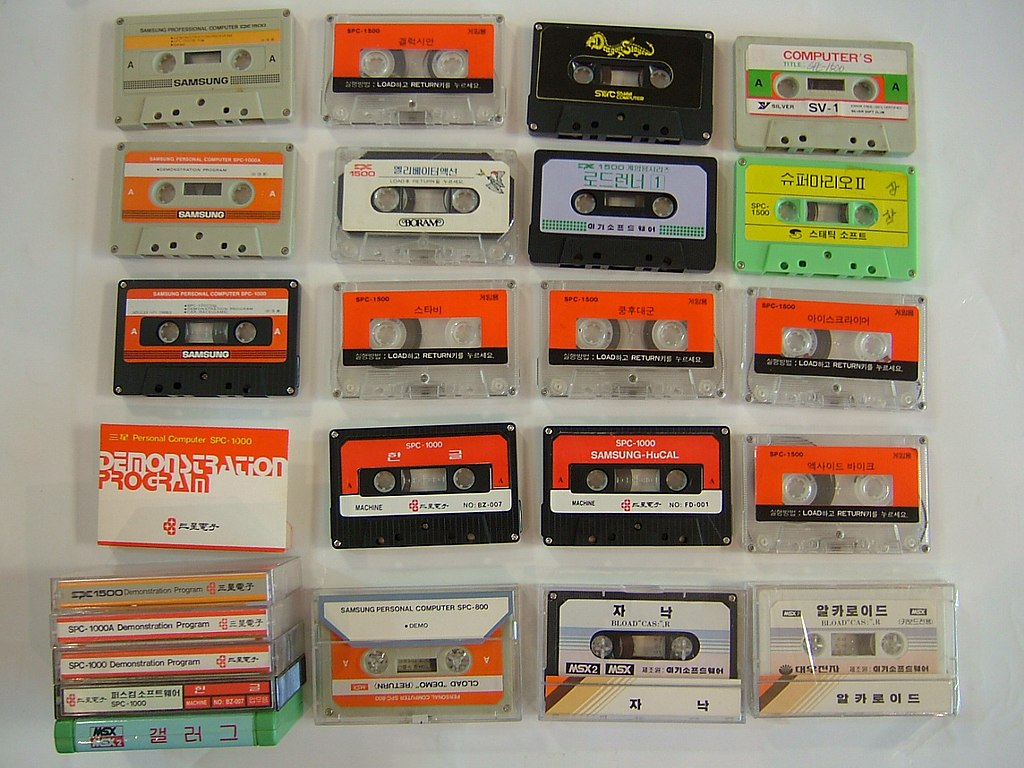 Image shows an array of cassette tapes