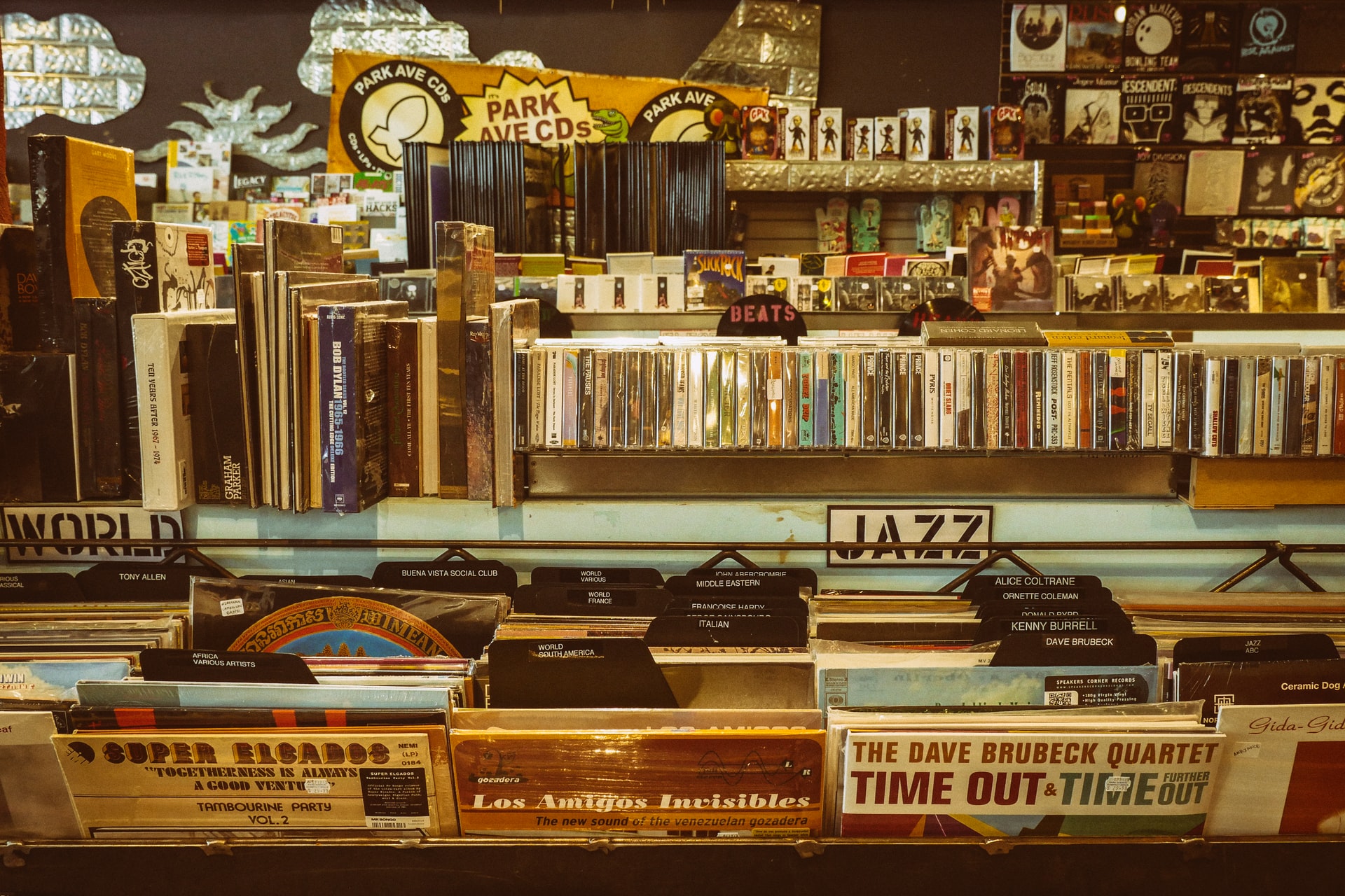 Photo of a display in a record store. - Photo by Mick Haupt on Unsplash